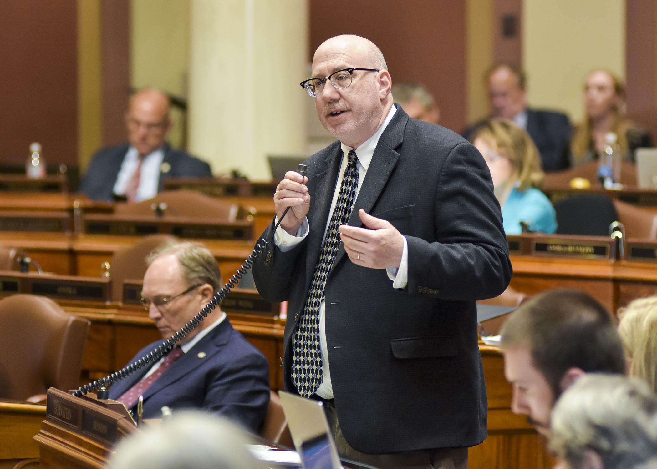 Rep. Frank Hornstein, chair of the House Transportation Finance and Policy Division, presents the omnibus transportation finance bill on the House Floor during Friday’s special session. Photo by Andrew VonBank